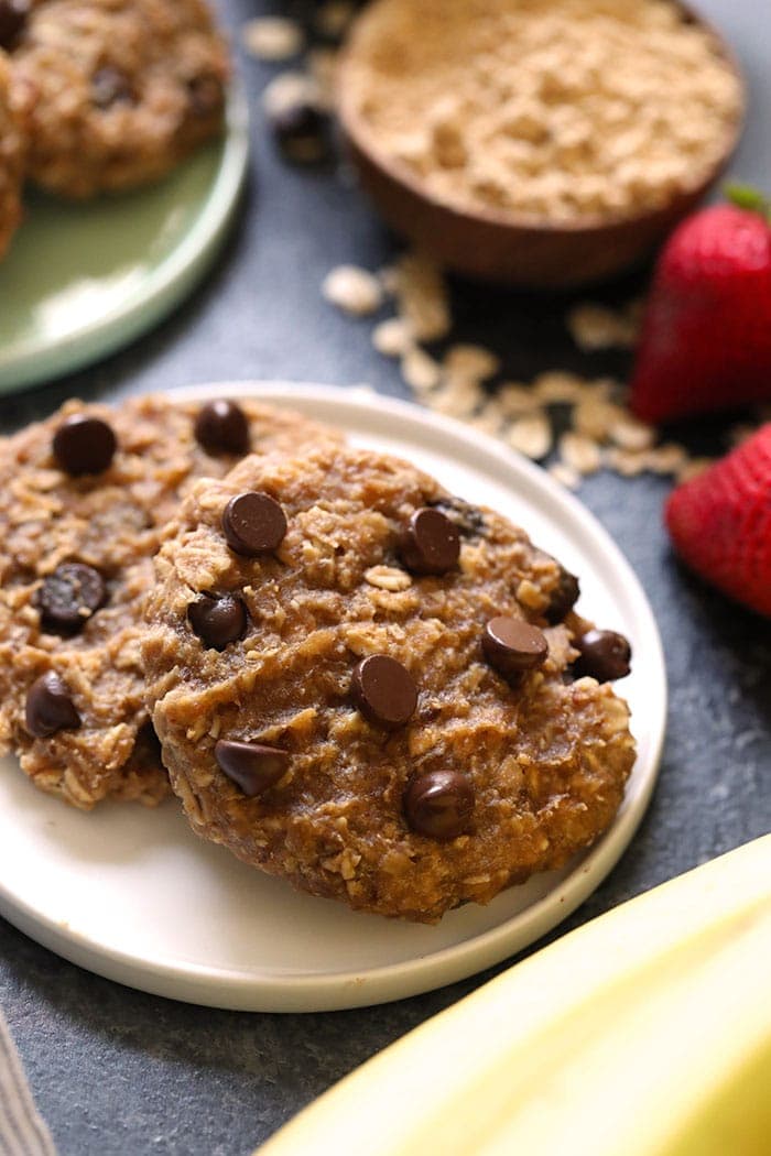 These healthy vegan peanut butter banana cookies for breakfast are a delicious option for an easy on-the-go breakfast for the week! Two cookies on a plate