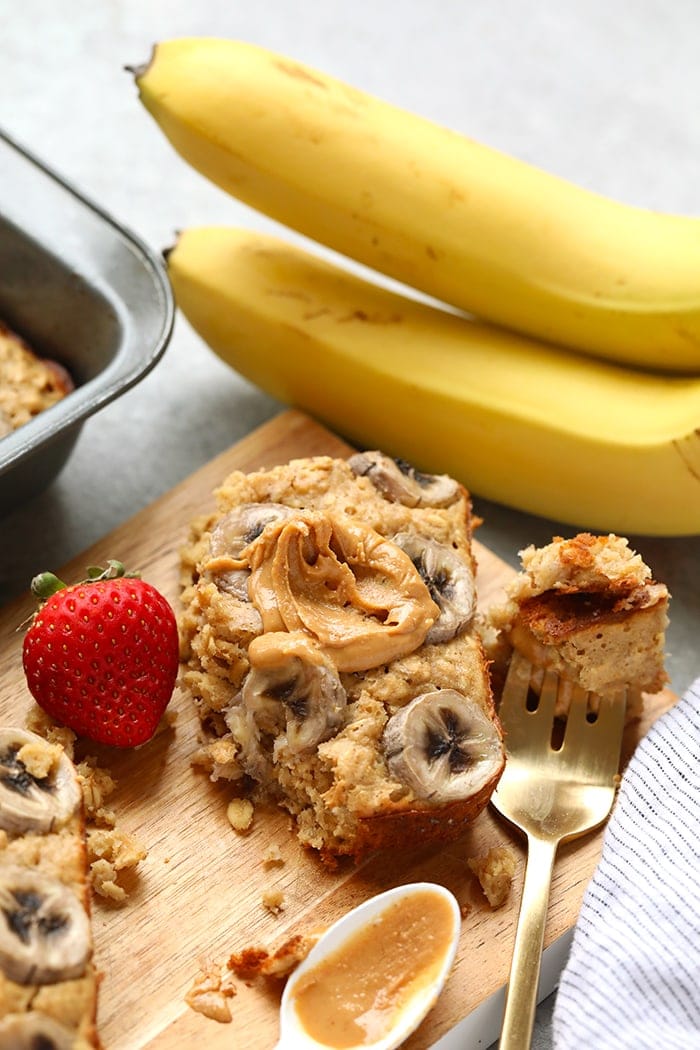 Baked oatmeal queens do we have a recipe for you! This Peanut Butter Banana Baked Oatmeal is perfectly sweetened with mashed banana and a little bit of maple syrup and gluten-free made with ground oat flour and rolled oats. Make this on the weekend for the family or during the week for a healthy breakfast meal prep recipe. baked oatmeal