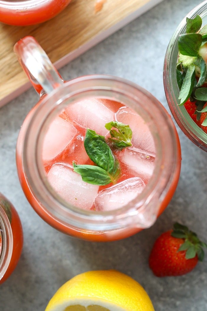 strawberry basil lemonade in a pitcher