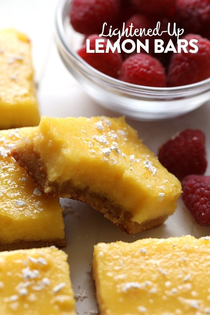 You only need 8 real food ingredients to make these healthy gluten free lemon bars! These little bites of heaven are also grain free, paleo, and lower in calories! gluten free lemon bars with bite taken out of it.