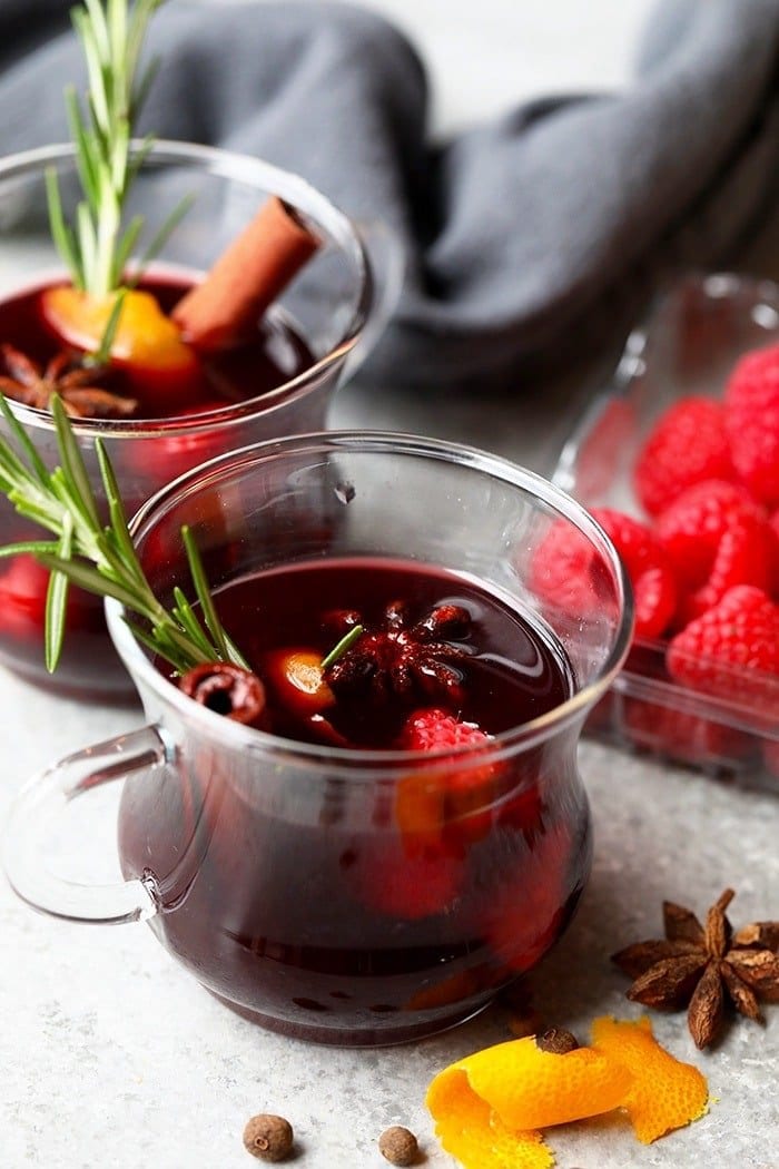 With just a few simple ingredients you can make this delicious, spicy mulled wine. This mulled wine recipe is perfect for a cool Fall day or the holidays! mulled wine in a glass mug