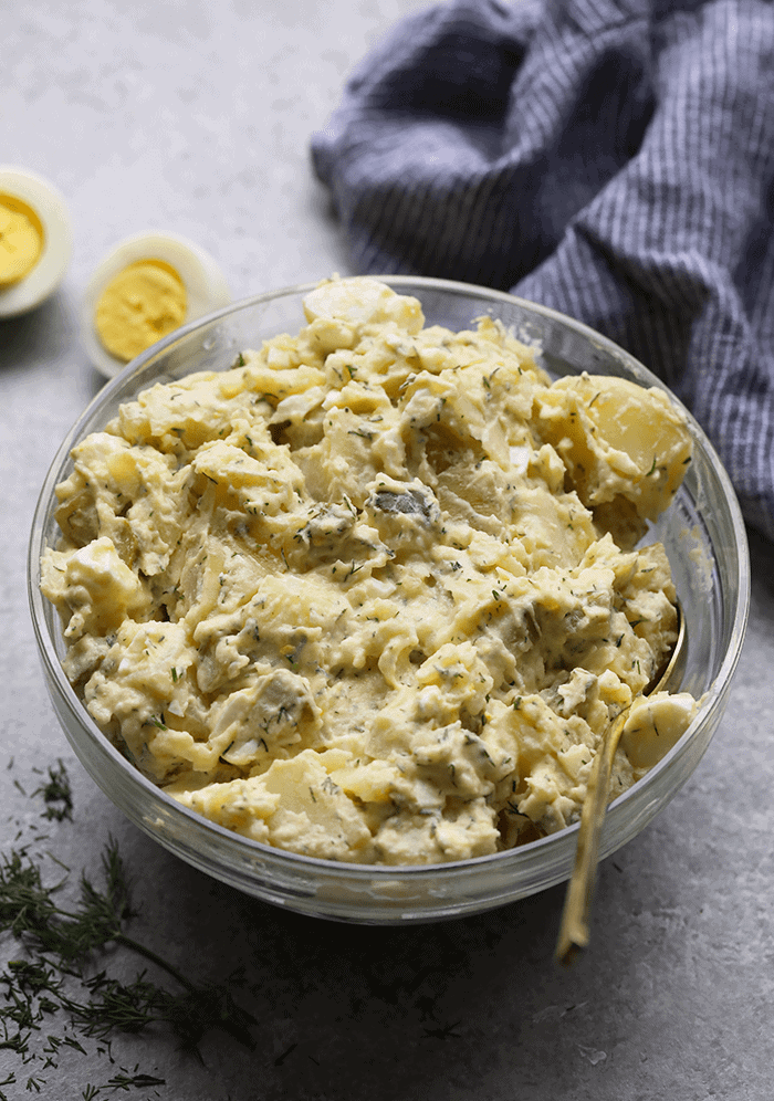 This Instant Pot Potato Salad is so easy to make and your potatoes and eggs only cook for 8 minutes in your pressure cooker! Instant Pot Potato Salad in bowl.