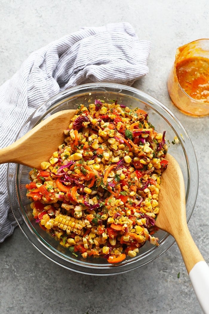This Thai Chili Corn Salad is a great side dish for burgers, chicken, or any other easy weeknight dinner. Whip up a big bowl and enjoy it all week long! Thai Chili Corn Salad in a bowl.