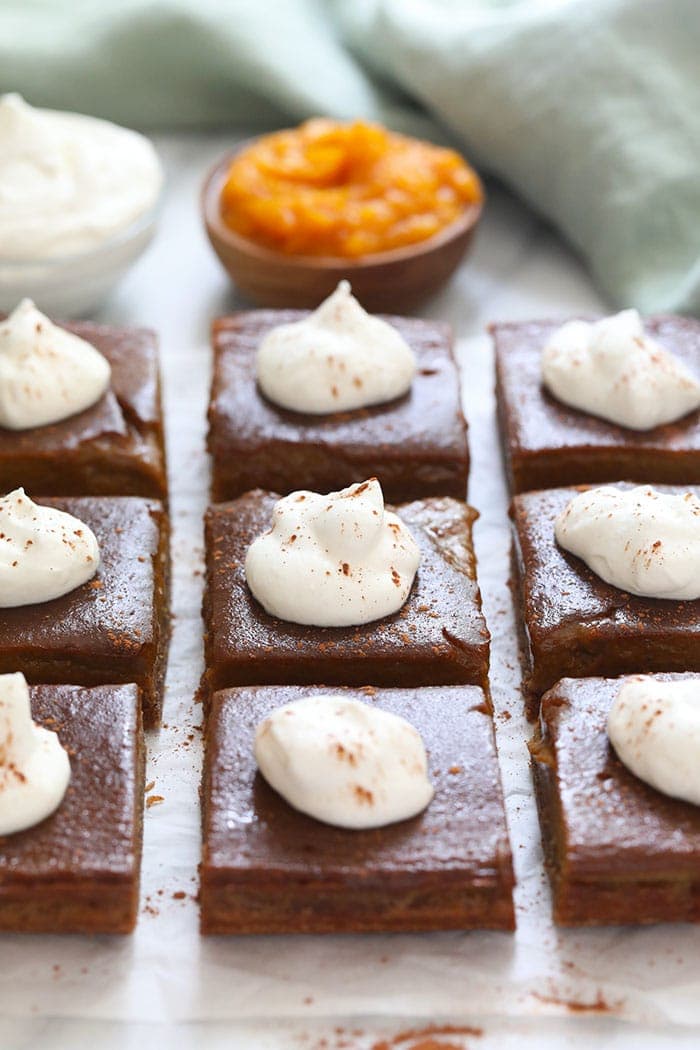 pumpkin pie bars with whipped cream topping