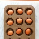 Guide on making hard boiled eggs in the oven.