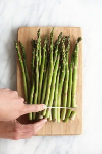 slicing asparagus.