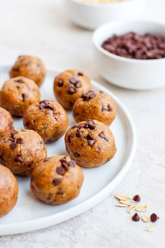 Cookie dough bites that are actually healthy and edible? Heck to the yes. With 7 ingredients (no eggs!) you can make these epic energy balls! cookie dough bites on plate