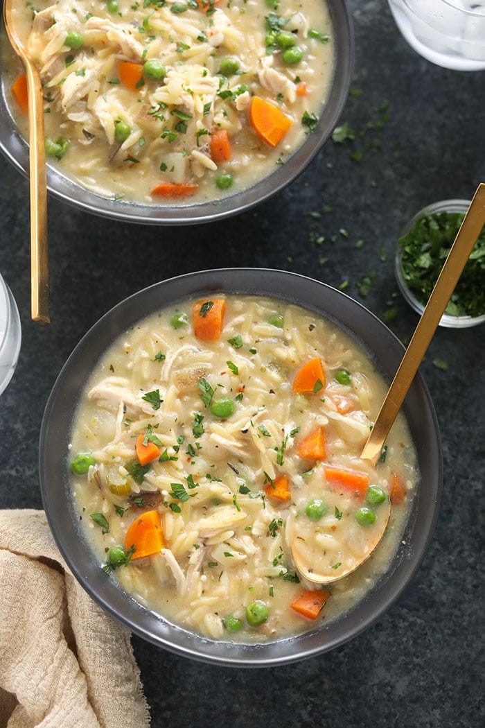 Creamy Chicken Noodle Soup is a healthy dinner idea that the whole family will love. It's packed with tons of protein and veggies and is creamy as can be! creamy chicken noodle soup