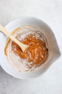 mixing wet and dry ingredients.