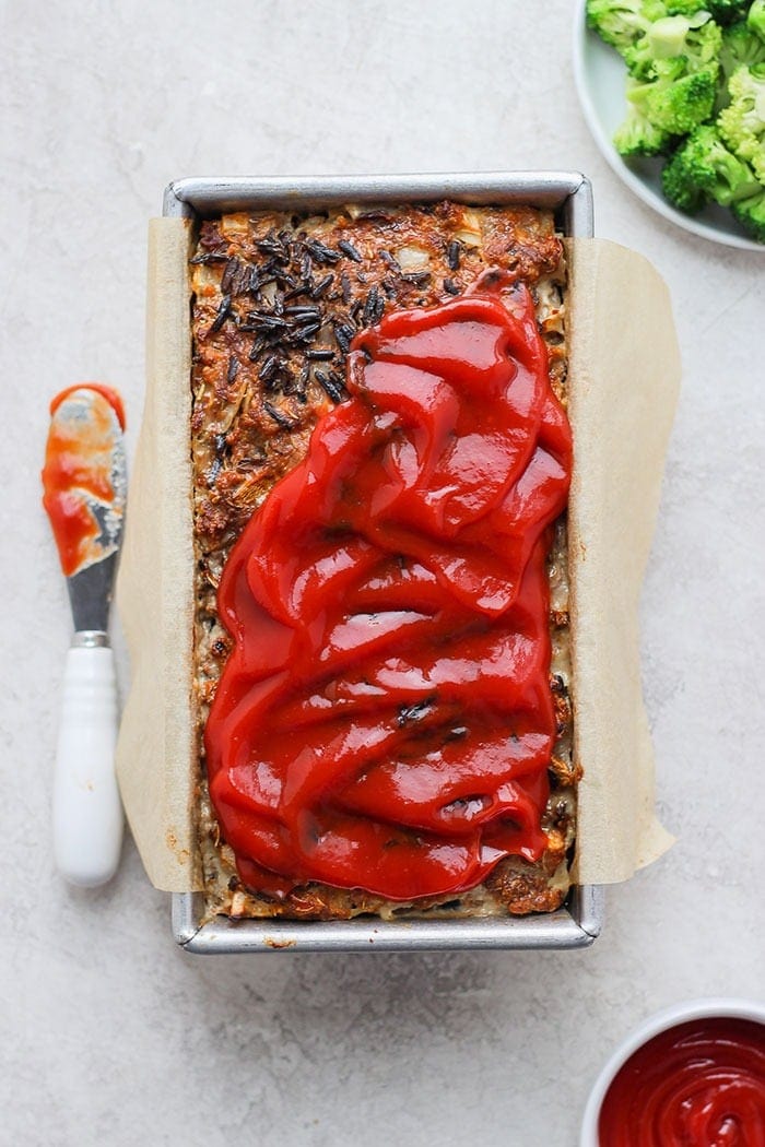 This Wild Rice Meatloaf packs all the savory flavors you love during the colder months of the year. Cozy up and make this easy and delicious meatloaf recipe for dinner tonight! wild rice meatloaf in a loaf pan