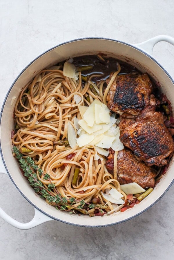 A delicious dish of chicken and pasta in a flavorful red wine sauce.