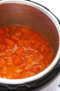 A delicious instant pot soup made with sweet potato, carrot, and ginger.