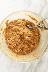 apple oatmeal cookie dough in bowl.