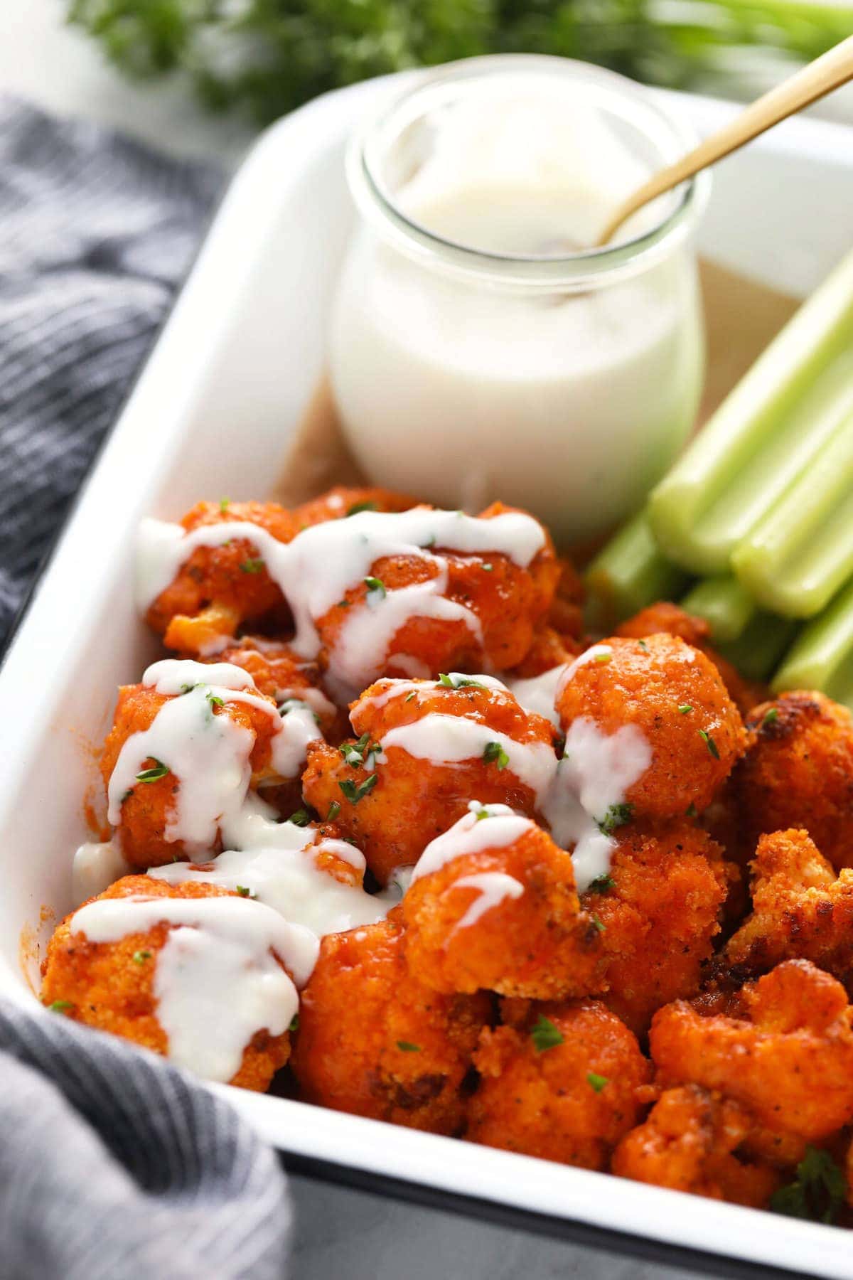 Seriously the best air fryer cauliflower wings made with a delicious homemade buffalo sauce. They're crunchy and the perfect appetizer! buffalo cauliflower air fryer recipe