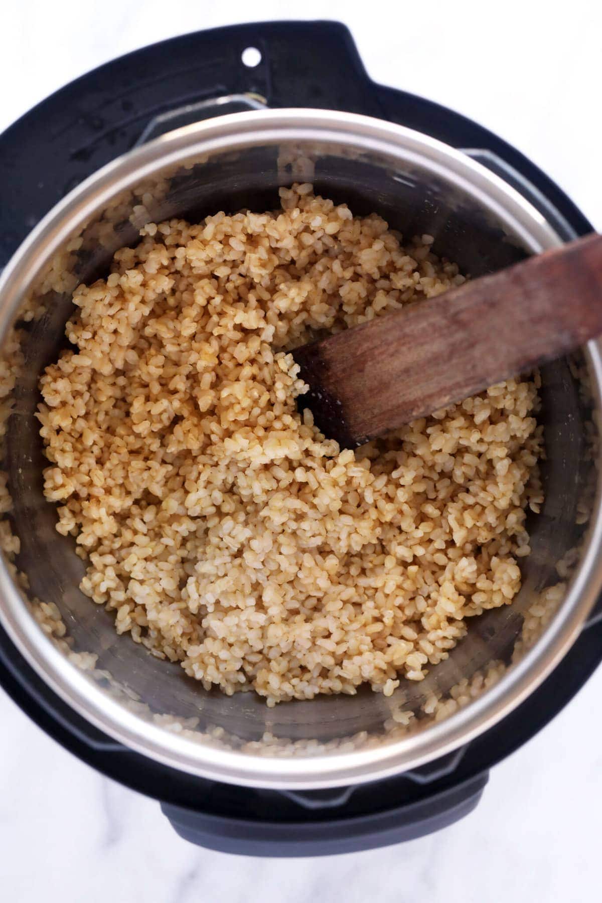 This Instant Pot brow rice produces delicious fluffy rice every time. Fluffy rice in an Instant Pot.
