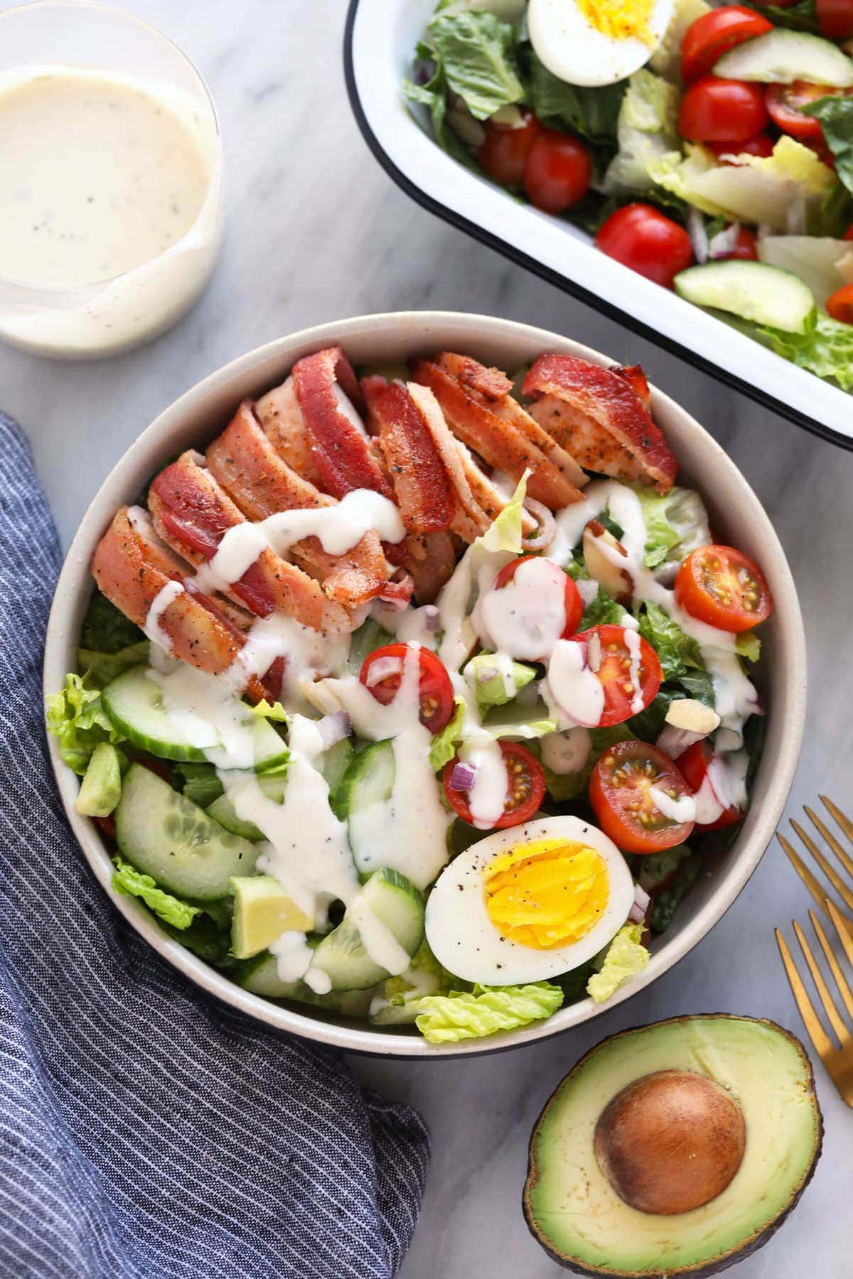 This crunchy bacon wrapped chicken salad is packed with veggies, hard boiled eggs, homemade ranch dressing, and flavorful bacon wrapped chicken! chicken salad with ranch dressing