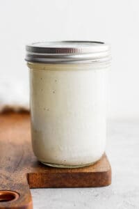 a jar of white liquid.