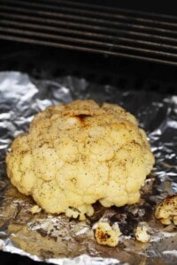 a close up of a piece of food on tin foil.