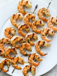 Grilled shrimp on plate.