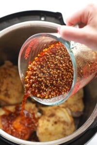 pouring in honey garlic sauce.