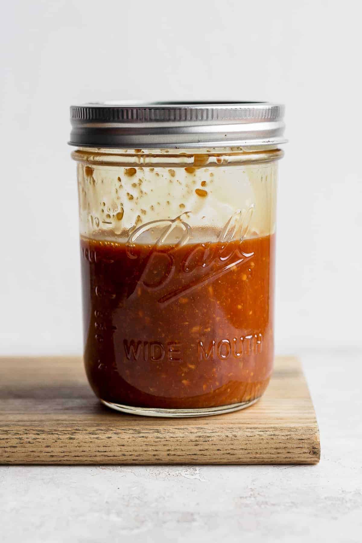 This easy stir fry sauce is our go-to for all things stir fry! Only 9 ingredients, and comes together in seconds. Bookmark this stir fry sauce to always have on hand. stir fry sauce in a mason jar