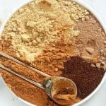 a bowl full of ingredients for a pumpkin spice latte, including pumpkin pie spice.