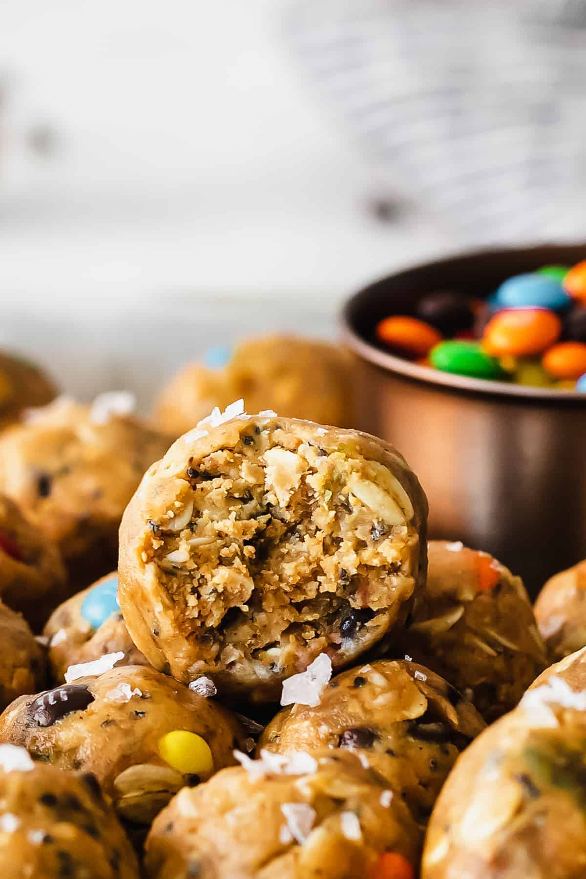 Say hello to monster cookie protein balls! These yummy protein balls are made with classic monster cookie ingredients in addition to protein powder for an extra boost of nutrition. monster cookie protein balls