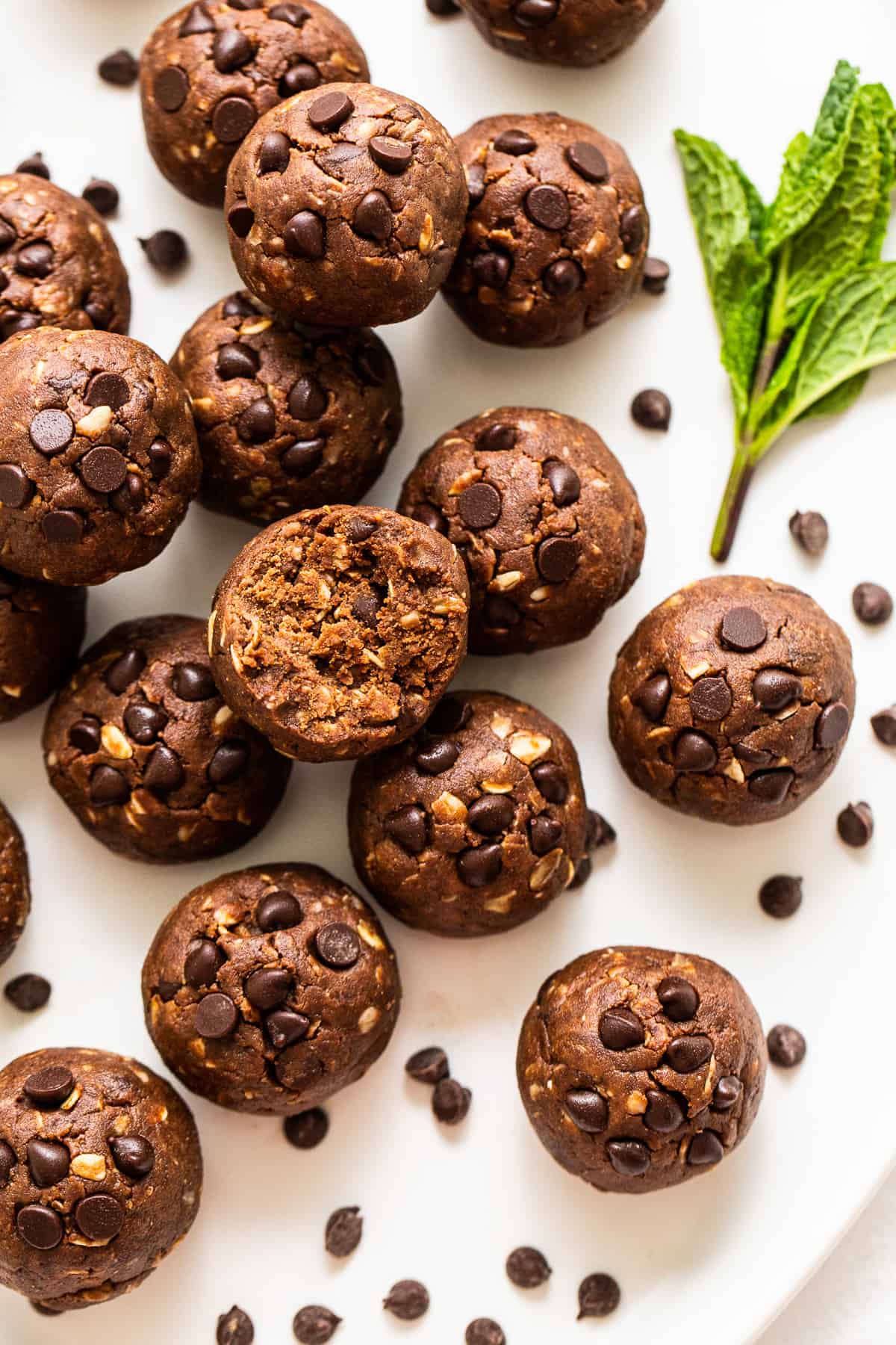 Mint Chip Protein Balls are an easy homemade way to get an extra boost of protein while knowing what's inside your bar (or ball!). protein balls on platter.
