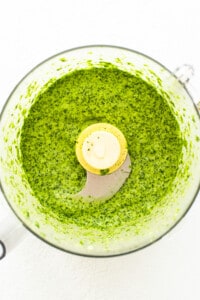 Green sauce in a food processor.