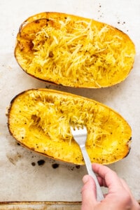 forking spaghetti squash.