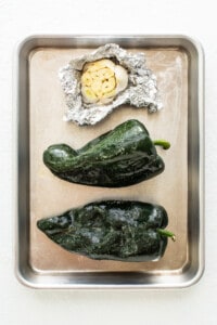 roasting poblanos and garlic.