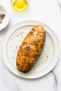 Olive oil drizzled on the potato.