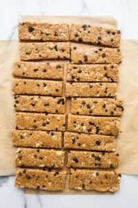 Chocolate chip granola bars on a baking sheet.