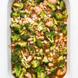 uncooked orange chicken casserole in dish.