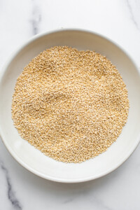Toasted quinoa in a bowl.