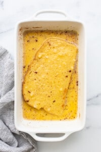 French toast in a white baking dish.