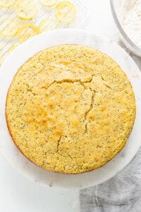 Lemon poppy seed cake on a white plate.
