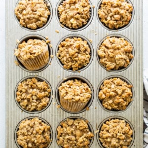 oatmeal muffins in a muffin tin.