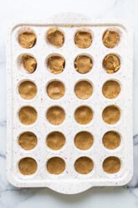 A tray filled with peanut butter cookies.