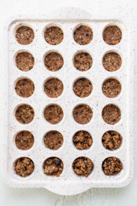 A tray filled with chocolate chip cookie dough.