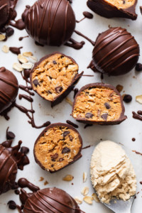 Chocolate covered peanut butter cups with a scoop of ice cream.