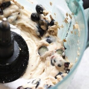 Blueberries and batter mixed together in a food processor for a Blueberry Muffin base.